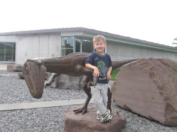 [Dinosaur and Kid]