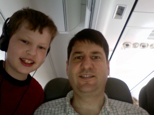 Blogging from an Airplane. Photo by howderfamily.com; (CC BY-NC-SA 2.0)