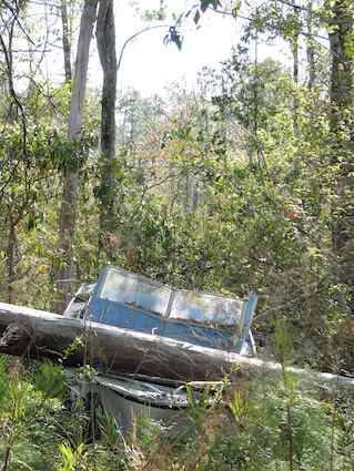 Abandoned boat in Mississippi after Hurricane Katrina. Photo by howderfamily.com; (CC BY-NC-SA 2.0)