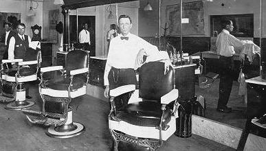 [John McGaughy Sr. at his barbershop]